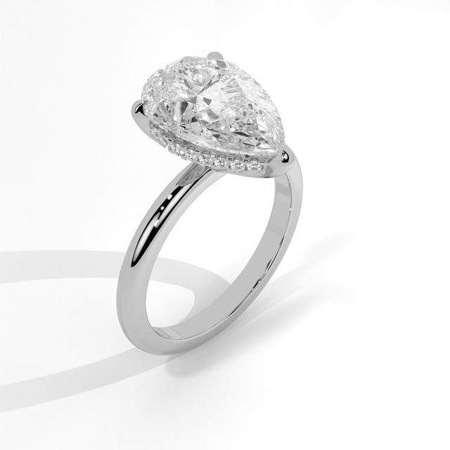 Elegant Pear Halo Diamond Ring